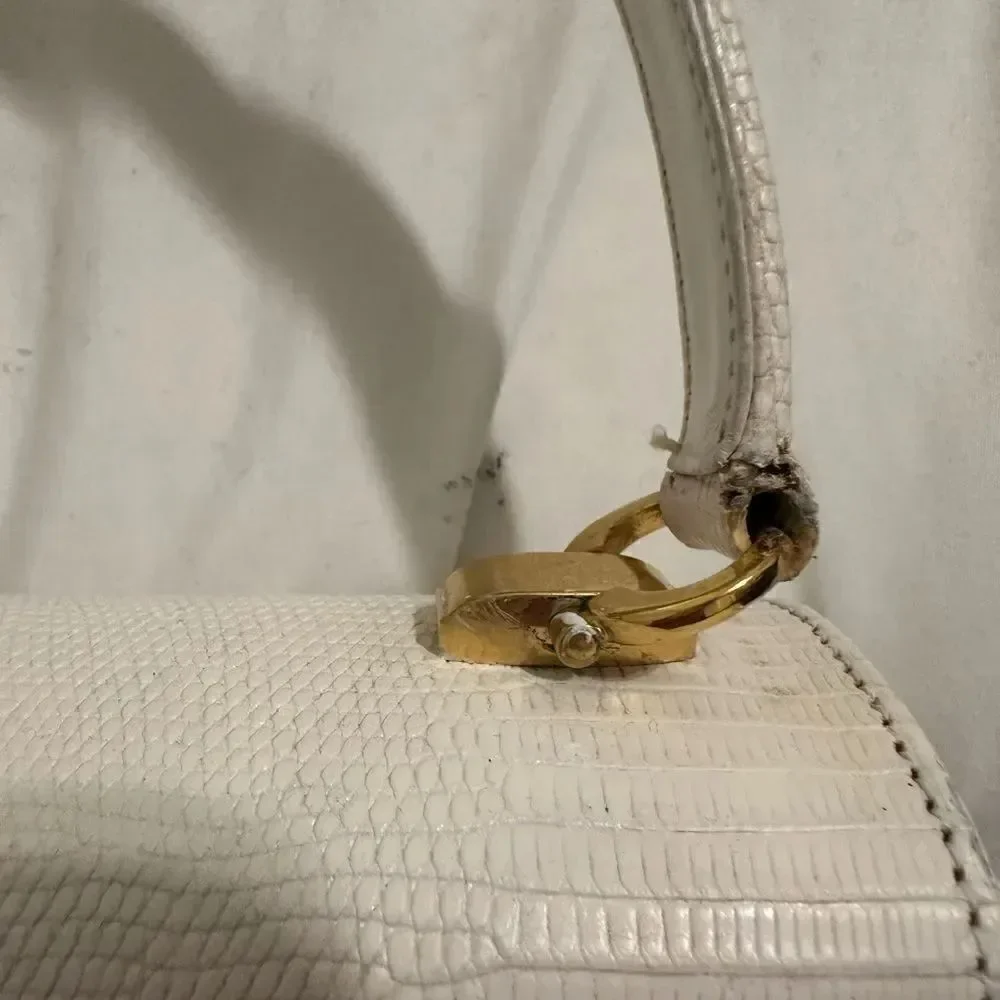 Gucci lizard embossed leather top handle tote